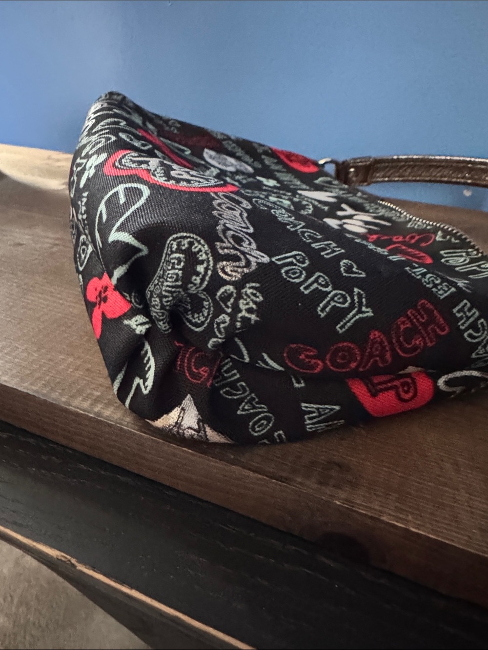 Coach Black Poppy Graphic Mini Wristlet with Red & Light Blue Accents - Picture 9 of 10